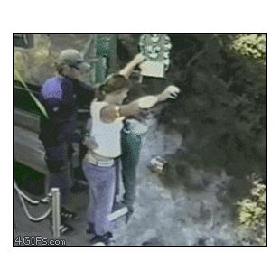 A woman gets help bungee jumping