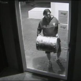 Drunk-burglar-keg-glass-door