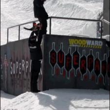 Snowboarder front flip