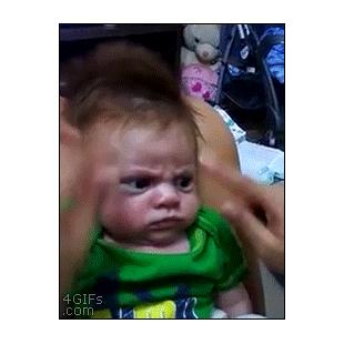 An angry baby is not amused.